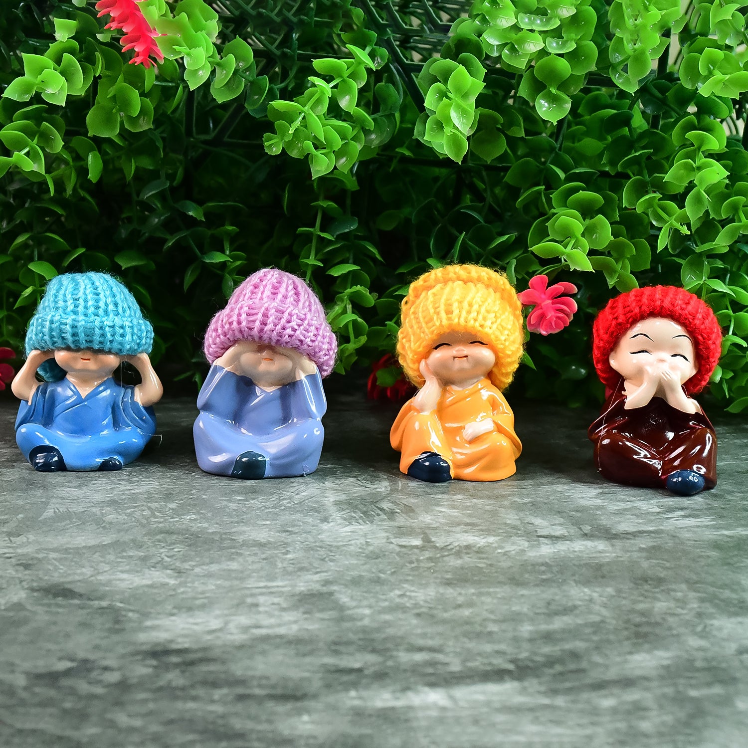 Decorative Resin Monk Buddha Showpiece Set of 4 with Straw Hats