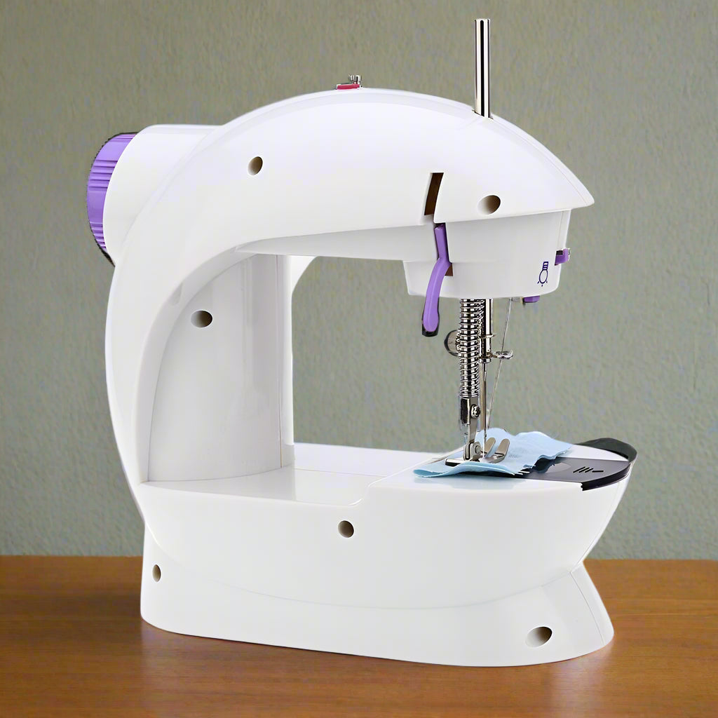 Portable Mini Handheld Sewing Machine – Compact & Easy Stitching
